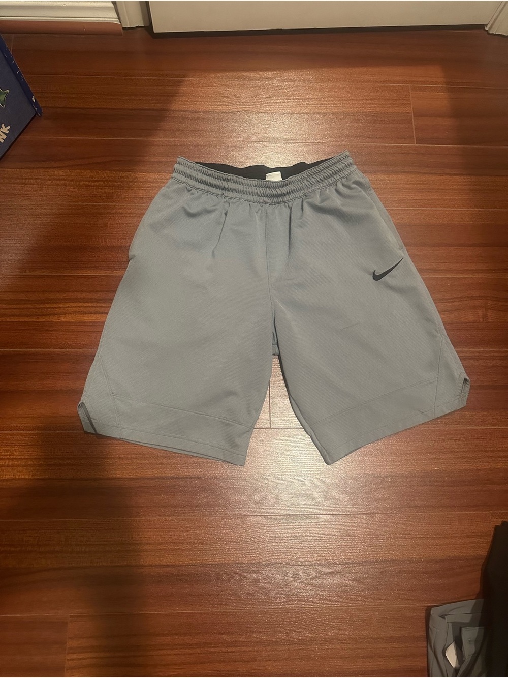 Nike Men's Light Gray Athletic Shorts with Black Swoosh